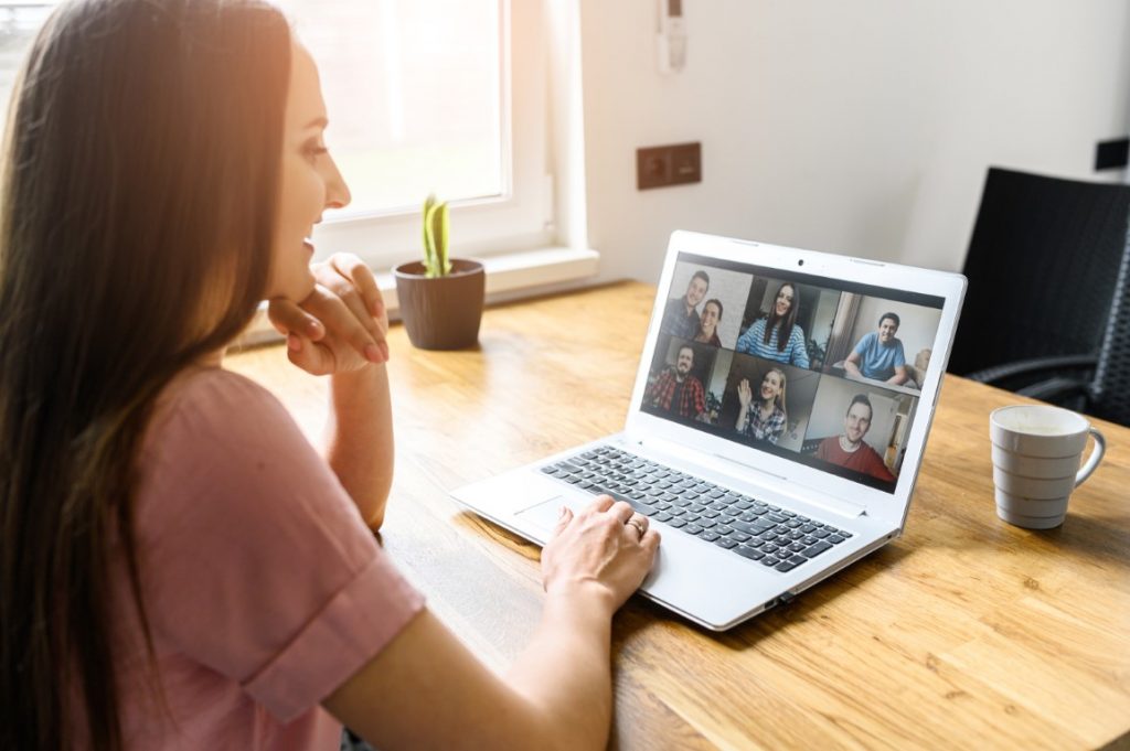 A young woman using laptop for video call, zoom